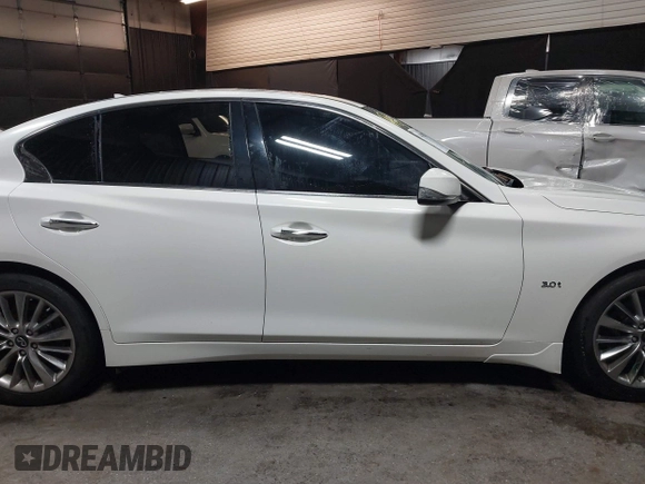 2020 Infiniti Q50 Luxe with VIN JN1EV7AR4LM251732, listed as a IAAI auction lot 41482077 with 12,799 mi miles and . Bid and sale history available at DreamBid. Image 13.