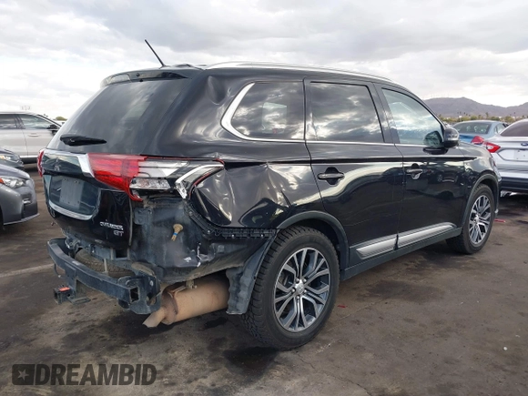 2016 Mitsubishi Outlander GT with VIN JA4JZ4AX0GZ033187, listed as a IAAI auction lot 41356040 with 100,462 mi miles and . Bid and sale history available at DreamBid. Image 4.