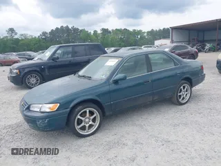 1997 Toyota Camry LE z VIN 4T1BG22K7VU005271, wystawiony jako IAAI lot #42098097 z przebiegiem Nie podano mil oraz . Historia ofert i sprzedaży dostępna na DreamBid. Obrazek 2.