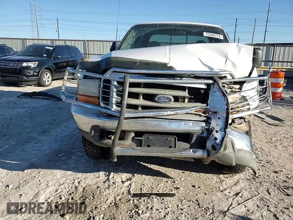 1999 Ford Super Duty F-250 XL with VIN 1FTNW21F6XEC74075, listed as a Copart auction lot 52581155 with 118,630 mi miles and Salvage Title. Bid and sale history available at carsss.com. Image 11.