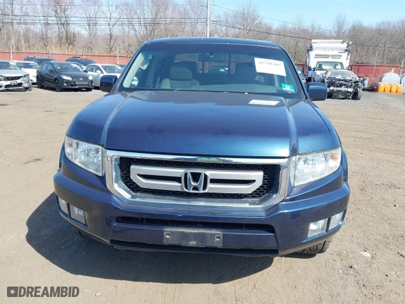 2011 Honda Ridgeline RTL with VIN 5FPYK1F51BB011686, listed as a IAAI auction lot 41790303 with 110,648 mi miles. Bid and sale history available at carsss.com. Image 12.
