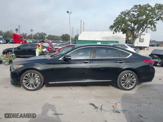 2016 Hyundai Genesis 3.8L with VIN KMHGN4JE7GU129448, listed as a IAAI auction lot 41456030 with 213,893 mi miles. Bid and sale history available at carsss.com. Image 14.