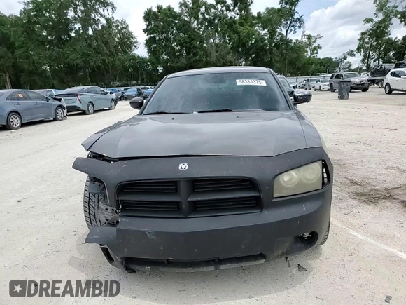 2009 Dodge Charger SE z VIN 2B3KA43DX9H530580, wystawiony jako Copart lot #58381375 z przebiegiem 300 292 mil mil oraz Szkoda całkowita • Salvage title. Historia ofert i sprzedaży dostępna na DreamBid. Obrazek 13.