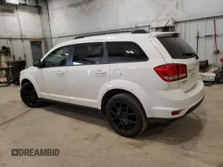 2013 Dodge Journey SXT with VIN 3C4PDCBG2DT660399, listed as a Copart auction lot 52440515 with 158,050 mi miles and Non Repairable. Bid and sale history available at DreamBid. Image 2.