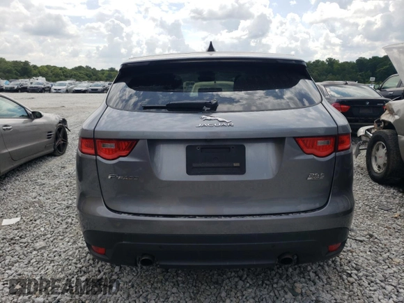 2020 Jaguar F-Pace 25t Premium z VIN SADCJ2FX2LA622614, wystawiony jako Copart lot #61855884 z przebiegiem 116 046 mil mil oraz Szkody całkowita. Historia ofert i sprzedaży dostępna na DreamBid. Obrazek 6.