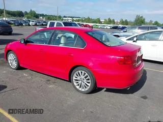 2014 Volkswagen Jetta TDI w/Premium with VIN 3VWLL7AJ8EM372627, listed as a IAAI auction lot 42418054 with 119,926 mi miles and . Bid and sale history available at DreamBid. Image 3.