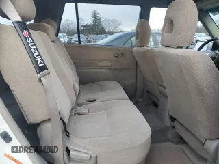 2004 Suzuki XL7 LX z VIN JS3TX92V544113433, wystawiony jako Copart lot #84066144 z przebiegiem 164 390 mil mil oraz Szkoda całkowita • Salvage title. Historia ofert i sprzedaży dostępna na DreamBid. Obrazek 10.