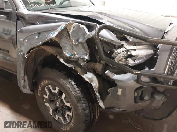 2019 Toyota Tacoma SR with VIN 5TFCZ5AN7KX208672, listed as a IAAI auction lot 42143071 with 83,584 mi miles and . Bid and sale history available at DreamBid. Image 18.