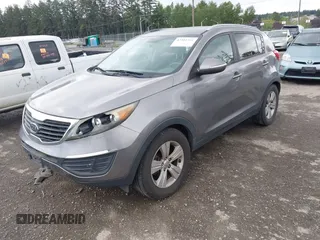 2012 Kia Sportage LX with VIN KNDPB3A22C7262656, listed as a IAAI auction lot 42301331 with 180,743 mi miles and . Bid and sale history available at DreamBid. Image 2.