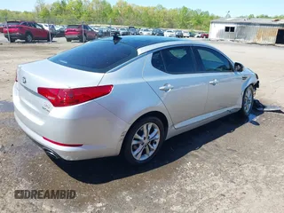 2013 Kia Optima EX with VIN 5XXGN4A73DG108068, listed as a IAAI auction lot 42059774 with 210,179 mi miles and . Bid and sale history available at carsss.com. Image 4.