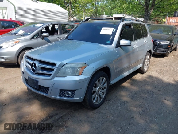 2010 Mercedes-Benz GLK GLK 350 with VIN WDCGG8HB4AF399020, listed as a IAAI auction lot 42180015 with 313,310 mi miles. Bid and sale history available at carsss.com. Image 2.