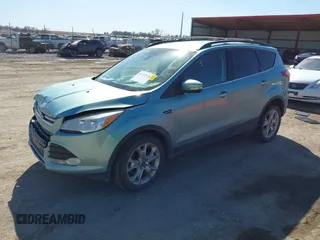 2013 Ford Escape SEL with VIN 1FMCU9HX2DUA71931, listed as a IAAI auction lot 41757318 with 149,344 mi miles. Bid and sale history available at carsss.com. Image 17.