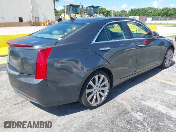 2014 Cadillac ATS Luxury RWD z VIN 1G6AB5RAXE0142079, wystawiony jako IAAI lot #42517963 z przebiegiem 140 118 mil mil oraz . Historia ofert i sprzedaży dostępna na DreamBid. Obrazek 4.