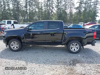 2020 Chevrolet Colorado 4WD LT with VIN 1GCGTCEN5L1233382, listed as a IAAI auction lot 42489220 with 61,949 mi miles and . Bid and sale history available at DreamBid. Image 14.