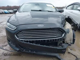 2015 Ford Fusion SE z VIN 3FA6P0H98FR273212, wystawiony jako IAAI lot #41952167 z przebiegiem 123 359 mil mil oraz . Historia ofert i sprzedaży dostępna na DreamBid. Obrazek 11.