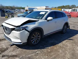 2020 Mazda CX-9 Grand Touring with VIN JM3TCADY5L0413201, listed as a IAAI auction lot 41462802 with 164,625 mi miles. Bid and sale history available at carsss.com. Image 2.