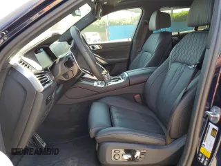 2023 BMW X6 M50i with VIN 5UXCY8C09P9P28422, listed as a Copart auction lot 52818133 with 4,131 mi miles and Salvage Title. Bid and sale history available at carsss.com. Image 7.