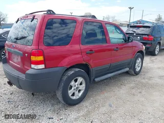 2006 Ford Escape XLT with VIN 1FMYU931X6KA24055, listed as a IAAI auction lot 42098827 with 175,261 mi miles. Bid and sale history available at carsss.com. Image 4.