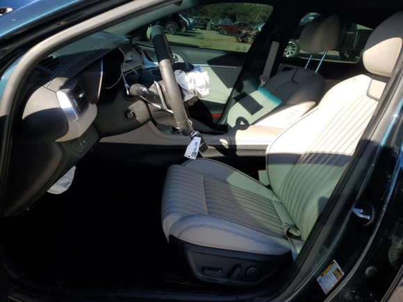 2023 Genesis G70 2.0T with VIN KMTG34TA5PU129955, listed as a Copart auction lot 82980774 with 12,625 mi miles and Salvage Title. Bid and sale history available at DreamBid. Image 7.