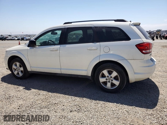 2013 Dodge Journey American Value with VIN 3C4PDCAB2DT547459, listed as a Copart auction lot 61217605 with 116,740 mi miles and Clean title. Bid and sale history available at DreamBid. Image 2.