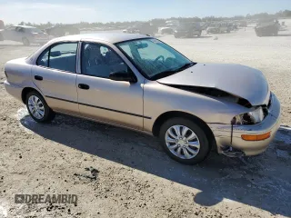 1996 Geo Prizm z VIN 1Y1SK5267TZ068437, wystawiony jako Copart lot #41403285 z przebiegiem 74 727 mil mil oraz Szkody całkowita. Historia ofert i sprzedaży dostępna na DreamBid. Obrazek 4.