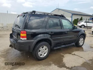 2005 Ford Escape XLT with VIN 1FMYU03165KA32552, listed as a Copart auction lot 59885535 with 179,442 mi miles and Non repairable. Bid and sale history available at DreamBid. Image 3.