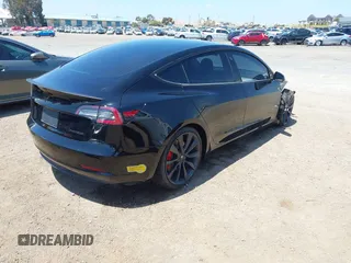 2020 Tesla Model 3 Performance z VIN 5YJ3E1EC5LF641593, wystawiony jako IAAI lot #42153291 z przebiegiem 70 264 mil mil oraz . Historia ofert i sprzedaży dostępna na DreamBid. Obrazek 4.