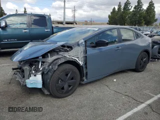 2023 Toyota Prius LE z VIN JTDACAAU1P3009821, wystawiony jako Copart lot #56592635 z przebiegiem 26 357 mil mil oraz Szkoda całkowita • Salvage title. Historia ofert i sprzedaży dostępna na DreamBid. Obrazek 1.