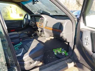 1997 Jeep Grand Cherokee Laredo with VIN 1J4GZ58S2VC605385, listed as a IAAI auction lot 41797715 with 169,996 mi miles and . Bid and sale history available at DreamBid. Image 5.