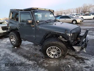 2017 Jeep Wrangler Willys Wheeler with VIN 1C4AJWAG6HL567730, listed as a Copart auction lot 87739395 with 46,286 mi miles and Salvage Title. Bid and sale history available at DreamBid. Image 4.