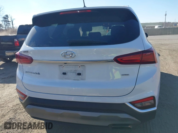 2019 Hyundai Santa Fe SE with VIN 5NMS2CAD5KH011357, listed as a IAAI auction lot 40918980 with 98,851 mi miles. Bid and sale history available at carsss.com. Image 16.