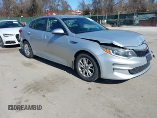 2016 Kia Optima LX with VIN 5XXGT4L37GG084538, listed as a IAAI auction lot 41784807 with 128,928 mi miles. Bid and sale history available at carsss.com. Image 1.
