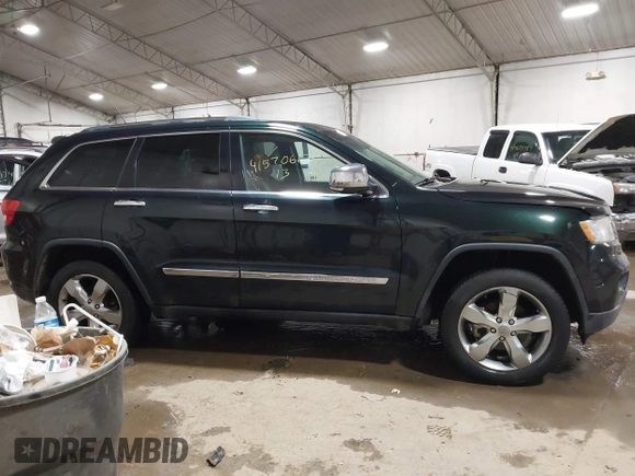 2013 Jeep Grand Cherokee Overland with VIN 1C4RJECT4DC526465, listed as a IAAI auction lot 41570663 with 116,948 mi miles. Bid and sale history available at carsss.com. Image 13.