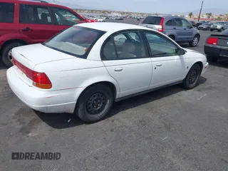 1998 Saturn SL z VIN 1G8ZJ5272WZ312413, wystawiony jako IAAI lot #41874493 z przebiegiem 229 200 mil mil oraz . Historia ofert i sprzedaży dostępna na DreamBid. Obrazek 4.