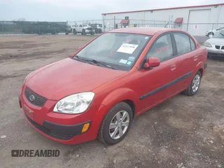 2009 Kia Rio SX with VIN KNADE223996556806, listed as a IAAI auction lot 42117938 with 54,007 mi miles. Bid and sale history available at carsss.com. Image 2.
