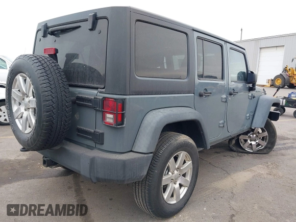 2014 Jeep Wrangler Unlimited Sport with VIN 1C4BJWDG4EL319259, listed as a IAAI auction lot 41494299 with 141,699 mi miles. Bid and sale history available at carsss.com. Image 4.