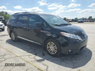 2015 Toyota Sienna XLE with VIN 5TDYK3DC4FS643797, listed as a Copart auction lot 55975385 with 61,882 mi miles and Salvage Title. Bid and sale history available at DreamBid. Image 4.