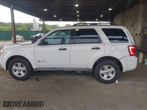 2009 Ford Escape Hybrid with VIN 1FMCU59399KC34999, listed as a IAAI auction lot 42515815 with 201,130 mi miles and . Bid and sale history available at DreamBid. Image 14.