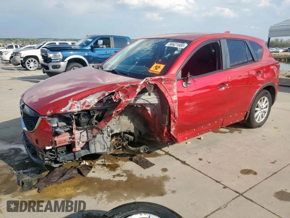 2014 Mazda CX-5 Touring with VIN JM3KE2CY1E0323298, listed as a Copart auction lot 50421685 with 214,739 mi miles and Salvage Title. Bid and sale history available at DreamBid. Image 1.