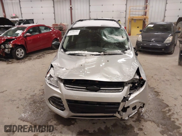 2014 Ford Escape SE z VIN 1FMCU9GX1EUD67624, wystawiony jako IAAI lot #41986362 z przebiegiem 79 921 mil mil oraz . Historia ofert i sprzedaży dostępna na DreamBid. Obrazek 6.