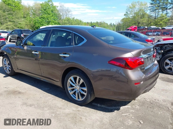 2015 Infiniti Q70 with VIN JN1BY1AR1FM560845, listed as a IAAI auction lot 42165981 with 75,767 mi miles and . Bid and sale history available at DreamBid. Image 3.