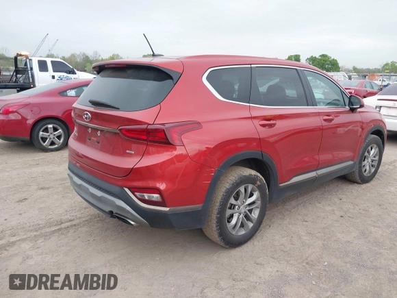 2019 Hyundai Santa Fe SE with VIN 5NMS2CAD5KH053852, listed as a IAAI auction lot 41962062 with 127,177 mi miles. Bid and sale history available at carsss.com. Image 4.