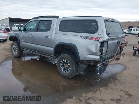 2017 Toyota Tacoma SR5 with VIN 3TMCZ5AN8HM051829, listed as a IAAI auction lot 41616329 with 64,113 mi miles and . Bid and sale history available at DreamBid. Image 3.