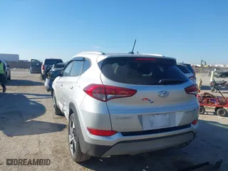 2017 Hyundai Tucson Value with VIN KM8J33A22HU457809, listed as a IAAI auction lot 41632652 with 26,154 mi miles. Bid and sale history available at carsss.com. Image 3.