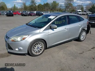 2012 Ford Focus SEL with VIN 1FAHP3H29CL151658, listed as a IAAI auction lot 42060139 with 149,547 mi miles and . Bid and sale history available at carsss.com. Image 2.