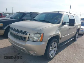 2008 Chevrolet Suburban LTZ with VIN 1GNFC16038R278002, listed as a IAAI auction lot 42036356 with 257,597 mi miles and . Bid and sale history available at DreamBid. Image 2.