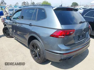 2023 Volkswagen Tiguan SE R-Line Black with VIN 3VVCB7AX8PM036684, listed as a IAAI auction lot 42169004 with 25,024 mi miles and . Bid and sale history available at DreamBid. Image 3.
