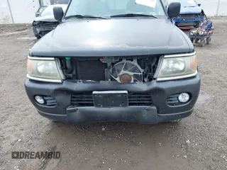 2000 Mitsubishi Montero Sport LS with VIN JA4LS31HXYP037471, listed as a IAAI auction lot 41820992 with 141,567 mi miles. Bid and sale history available at carsss.com. Image 6.
