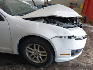 2010 Ford Fusion S with VIN 3FAHP0GA9AR180356, listed as a IAAI auction lot 41662335 with 171,048 mi miles. Bid and sale history available at carsss.com. Image 19.