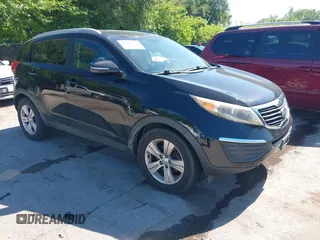 2013 Kia Sportage LX with VIN KNDPB3A29D7381287, listed as a IAAI auction lot 42697459 with 167,883 mi miles and . Bid and sale history available at DreamBid. Image 1.